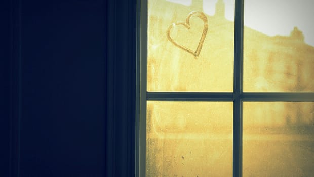 Heart shape drawn on a window