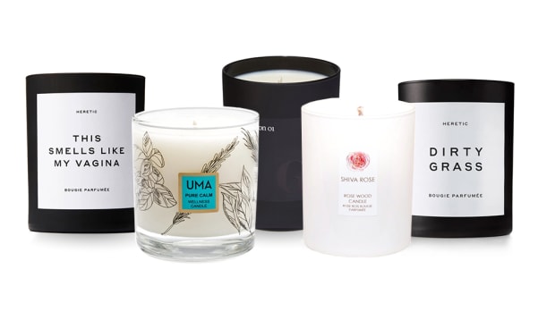 5 non toxic candles against a white background