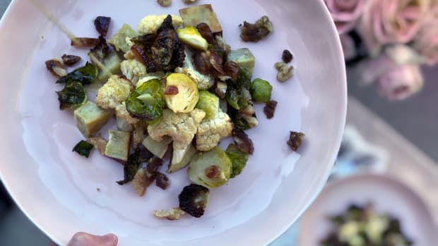 Brussels sprouts, cauliflower, dates on a plate