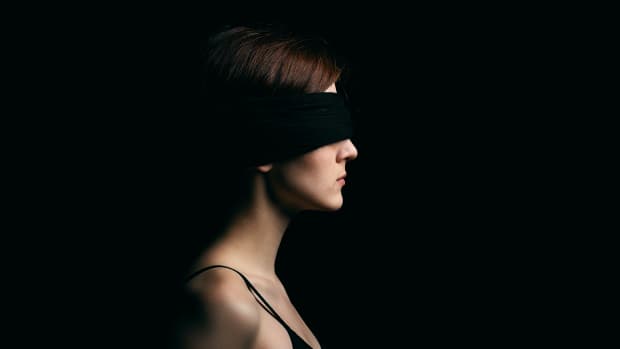 blindfolded woman dopamine detox
