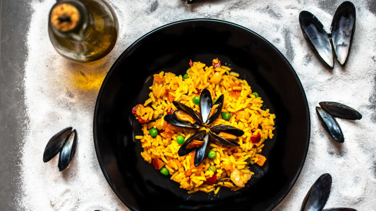 Travel Abroad without Leaving Home This Summer with Homemade Paella