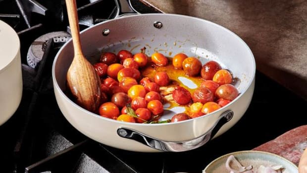 Cooking fresh tomato sauce in a Caraway pan on stovetop