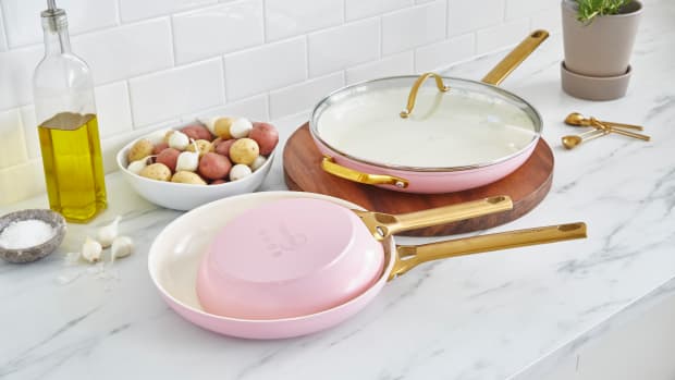Pink ceramic nonstick pans on counter.