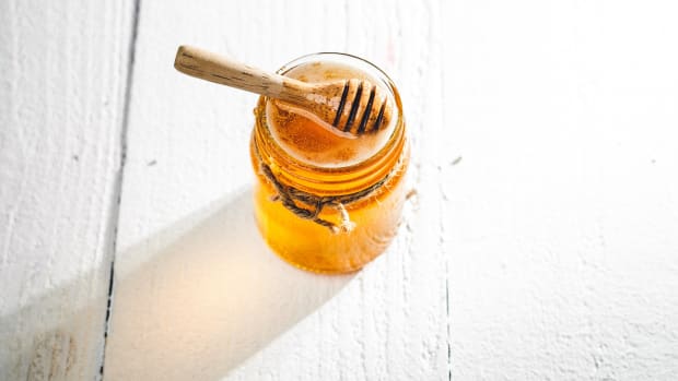A jar of honey to add a touch of sweetness to a dish to balance flavors