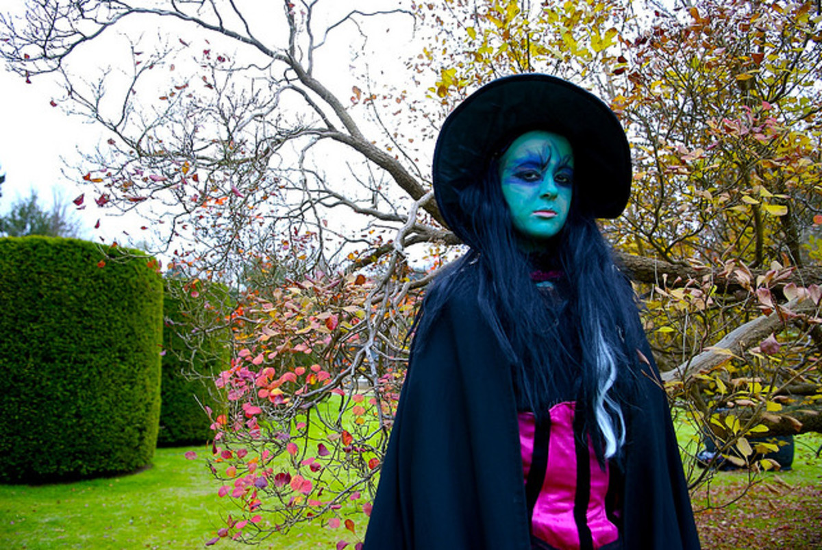 Woman dressed as witch.