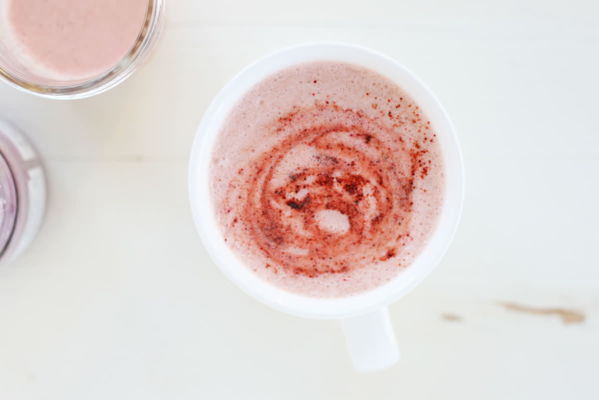 pretty pink beetroot latte in a white cup