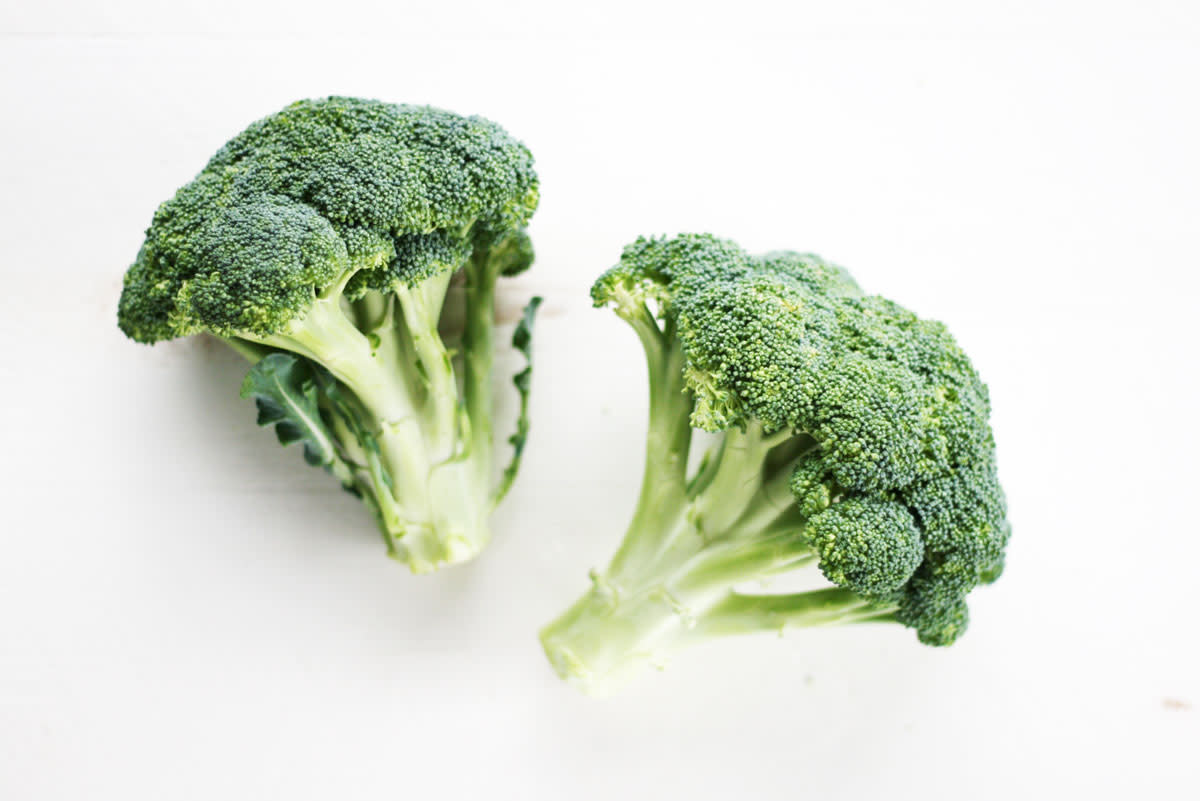 here's how to roast broccoli. Two heads of raw broccoli.
