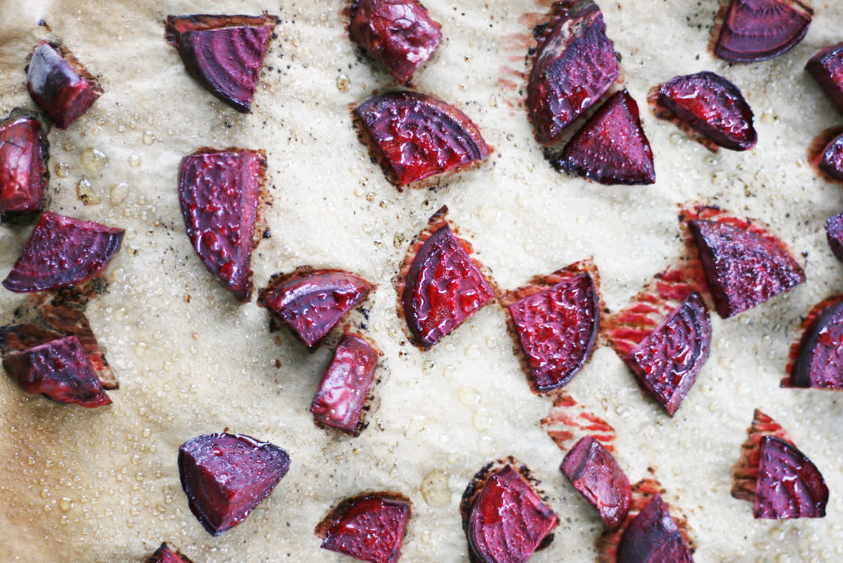 roasted beets on a sheet pan with parchment paper