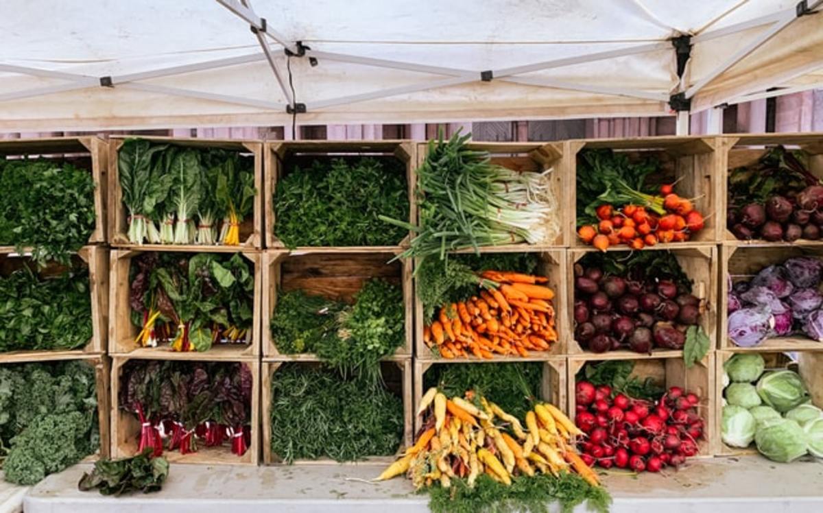 Beautiful farmers market stand. Fresh produce will build flavor for your meals.