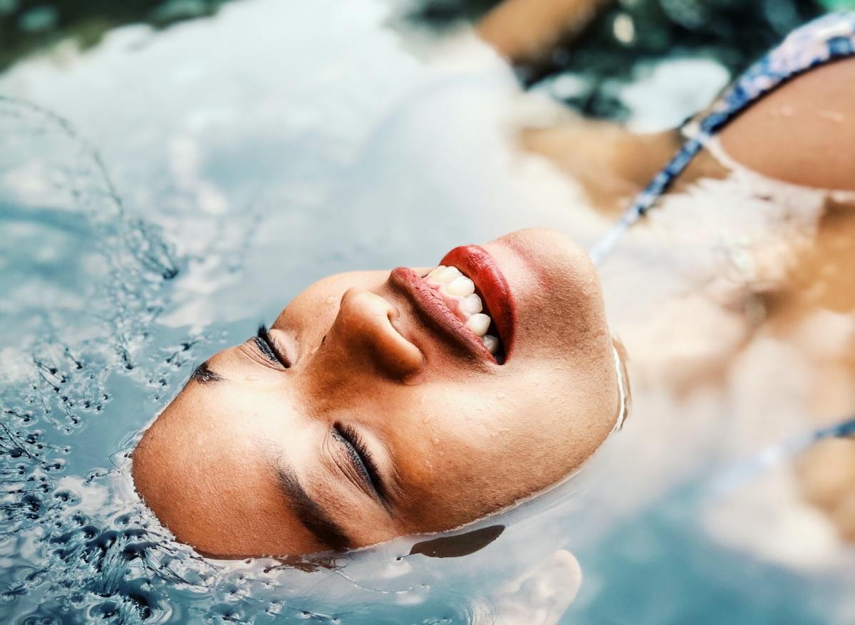 Woman in water smile