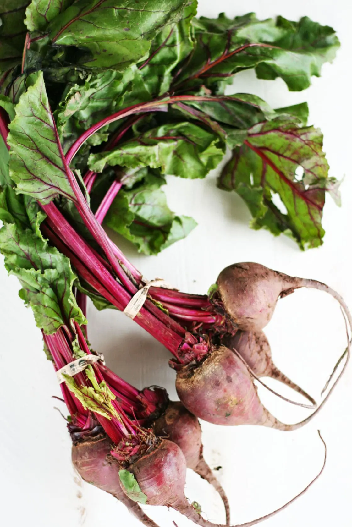 roasted beets on a sheet pan with parchment paper