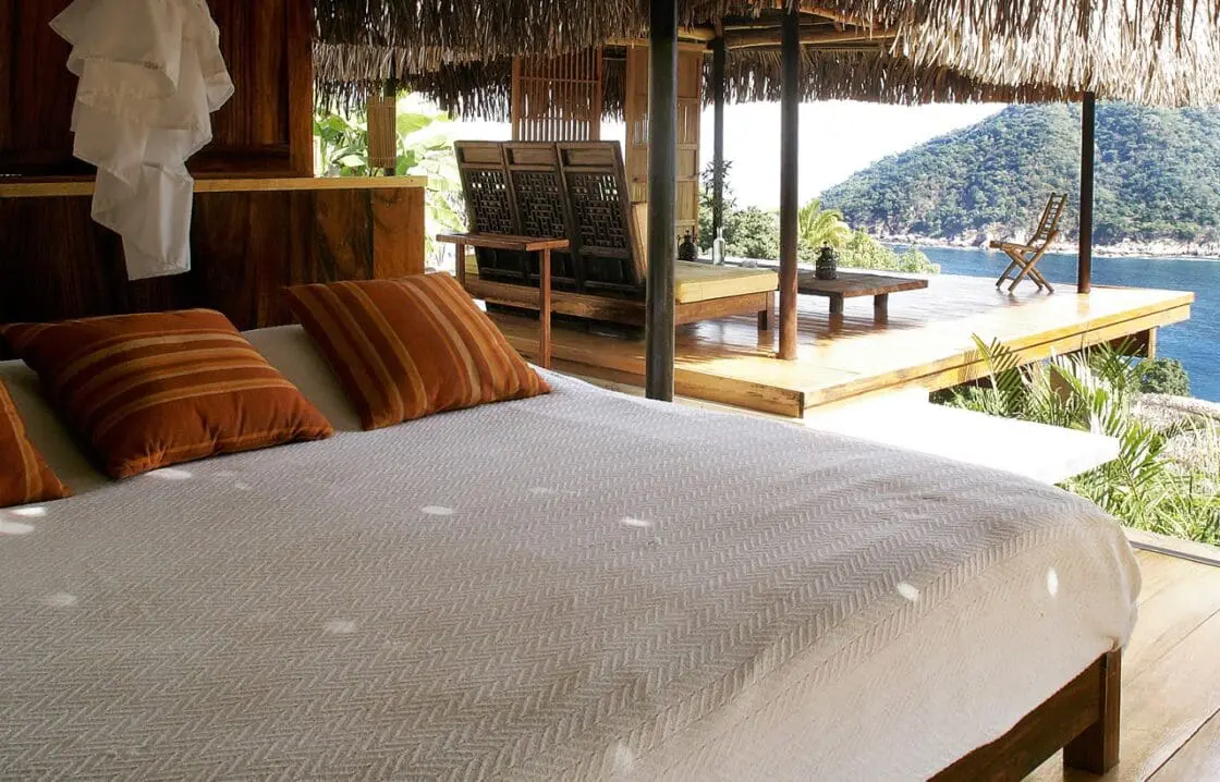 Beachfront bedroom at VERANA boutique hotel in Mexico with ocean views