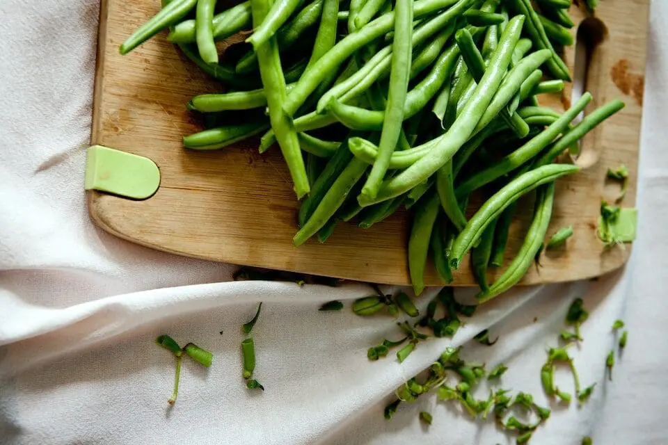 green beans on cutting board Organic Authority, are added to the Dirty Dozen