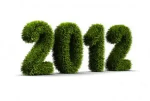 The year 2012 formed from green moss or grass texture against a white background
