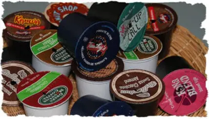 Collection of various branded single-serve coffee pods and containers