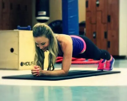 Vernon-Thompson executes a perfect plank.
