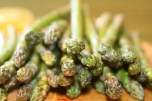 Fresh green asparagus spears with tips in close-up detail