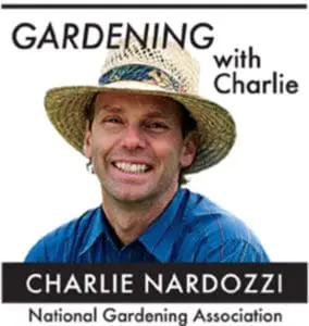 Charlie Nardozzi from the National Gardening Association in a straw hat and blue shirt