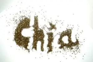 Chia seeds arranged to form silhouettes of a family