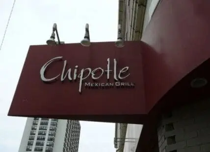 Chipotle Mexican Grill storefront sign on burgundy awning