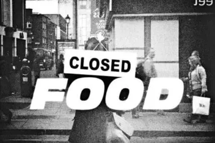 Closed food sign displayed on storefront during government shutdown