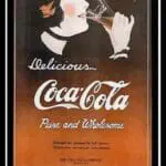 1914 Coca-Cola advertisement showing a woman drinking from a bottle, labeled "Delicious Coca-Cola