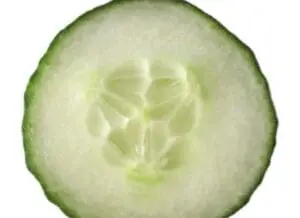 Cross-section of a fresh cucumber showing seeds and inner flesh