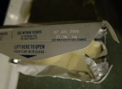 Close-up of a food package's expiration date label from July 2009