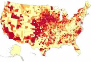 U.S. county map showing concentration of factory farms in red and dark red regions