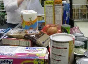 Assorted packaged groceries and pantry items displayed on a table