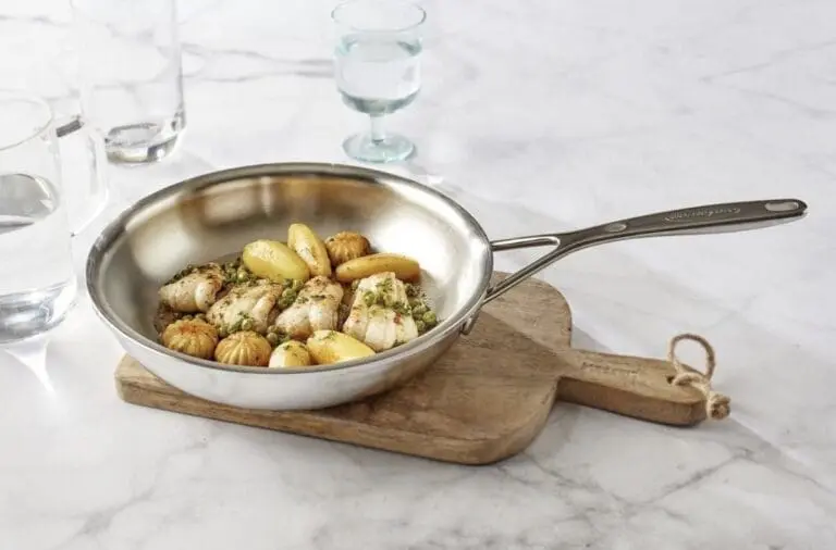 Image of a Demeyere stainless steel fry pan full of potatoes.