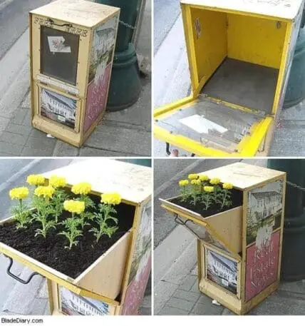 Repurposed yellow and cream newspaper dispensers filled with soil and blooming yellow flowers