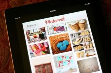 Pinterest app home screen displaying various food and home decor pins on tablet