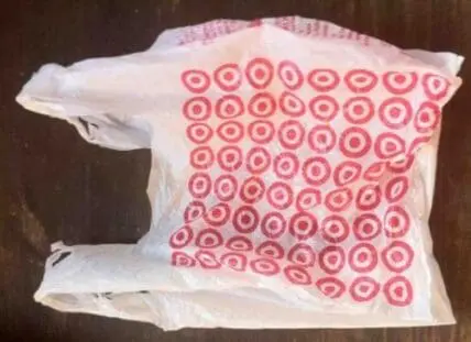 Paper bag with red Target logo circles printed on it