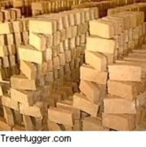 Stacked cardboard boxes in rows at a warehouse or storage facility