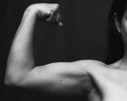 Woman flexing