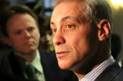 Rahm Emanuel at a public event with another person visible in the background