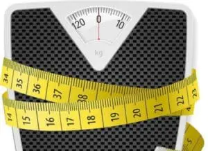 Bathroom scale with measuring tape wrapped around it
