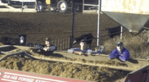 Peterson Farm Brothers in a hay wagon during their "Chore" music video parody