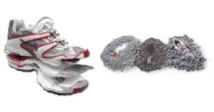 Worn athletic shoe next to pile of recycled shoe material