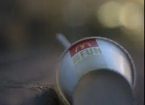 McDonald's cup with straw being magnified through a lens