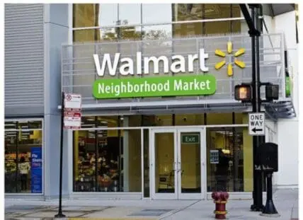 Walmart Neighborhood Market storefront on an urban street
