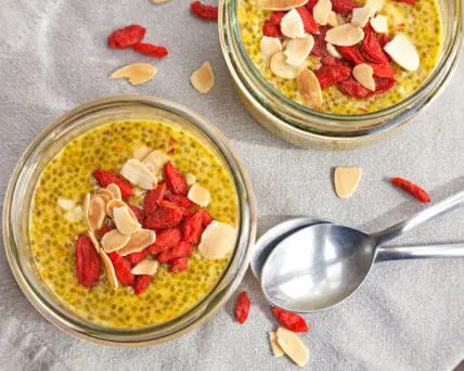 Start Your Day the Right (and Seasonal) Way with this Pumpkin Chia Seed Pudding Recipe. Image of chia seed pudding with gogi berries and sliced almonds