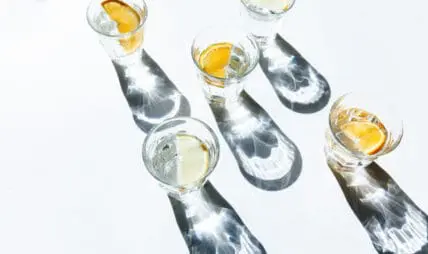Intermittant Fasting for brown fat. Photo of glasses of water with lemon and orange slices