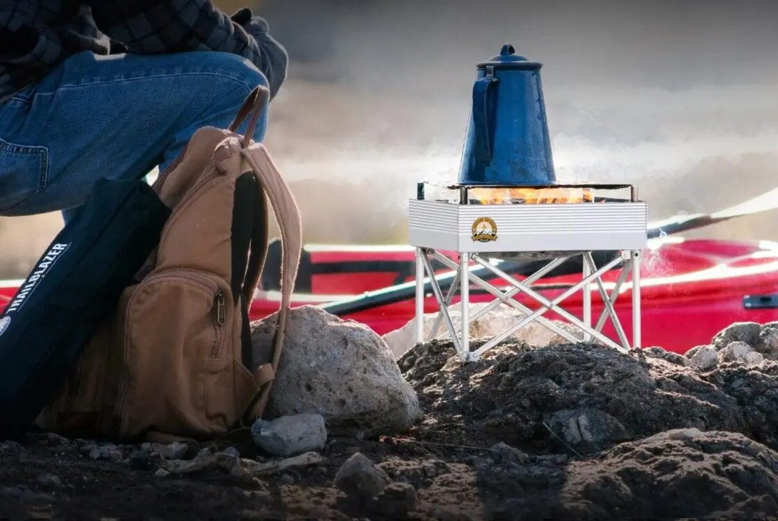 Boiling water in a tea kettle on a Fireside Outdoor Trailblazer
