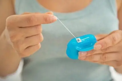 Nearly One Third of Americans Lie to Their Dentist About Flossing Teeth