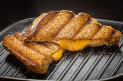 melted grill cheese on grill pan