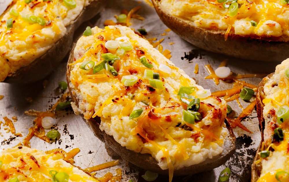 Vegan Baked Potato with Cheese, Tempeh Bacon, and Green Onions