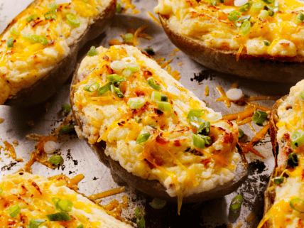 Vegan Baked Potato with Cheese, Tempeh Bacon, and Green Onions