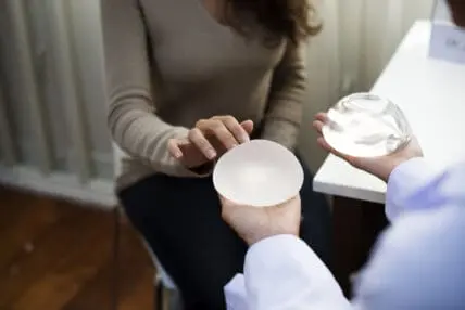 Could Your Mystery Illness Be Caused By Your Breast Implants?